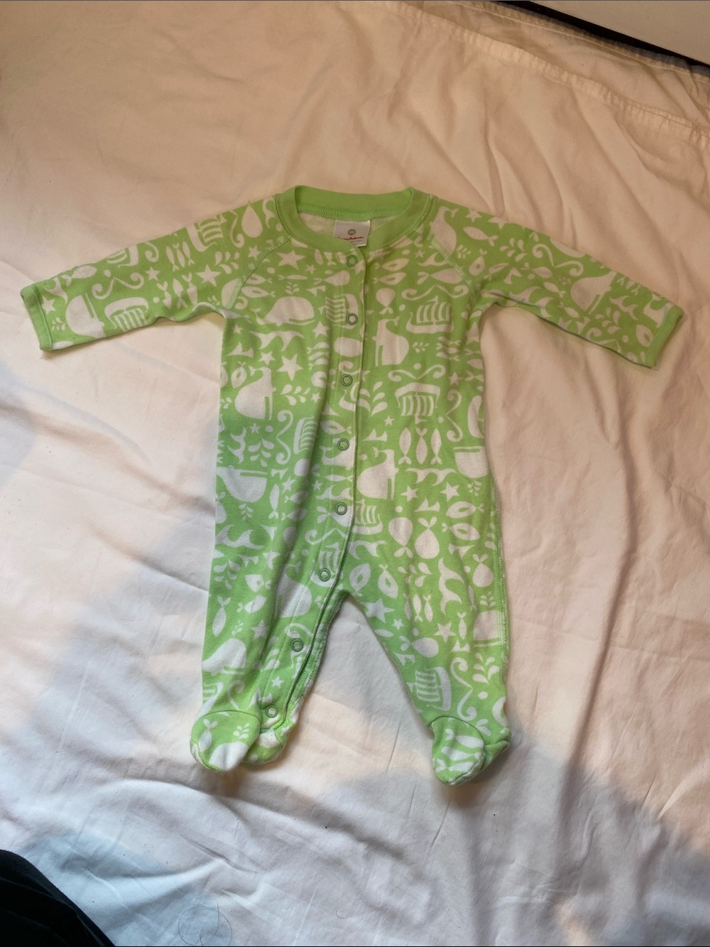 Hanna Andersson Light Green and White Animal Print Footed One-Piece